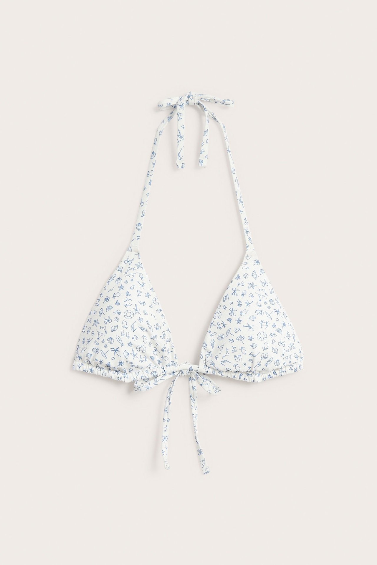 Widok z przodu na biało-niebieski usztywniany biustonosz bikini typu trójkąt z letnim nadrukiem.