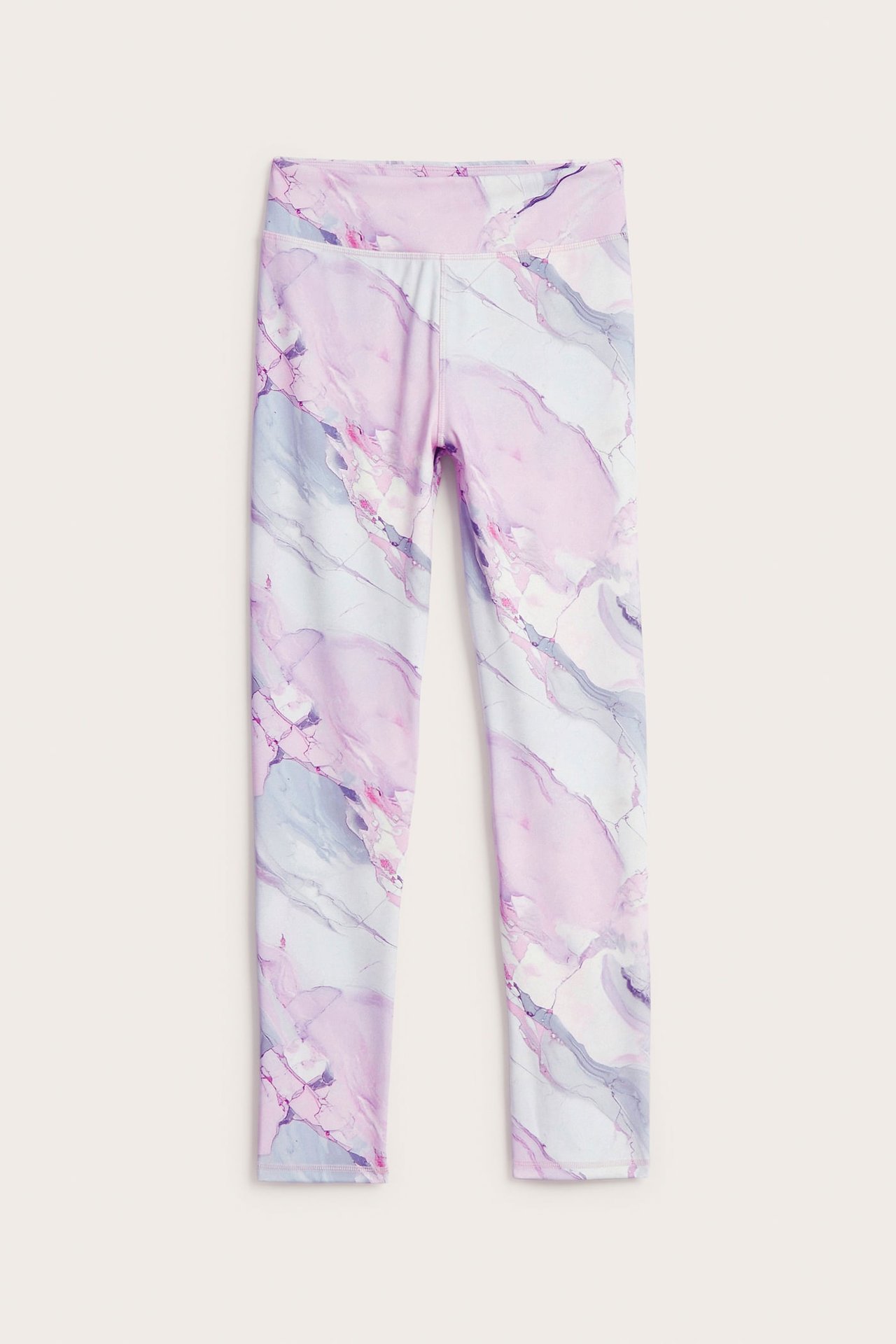 Framifrån, barnens off-white träningsleggings med lila och rosa marmormönster.