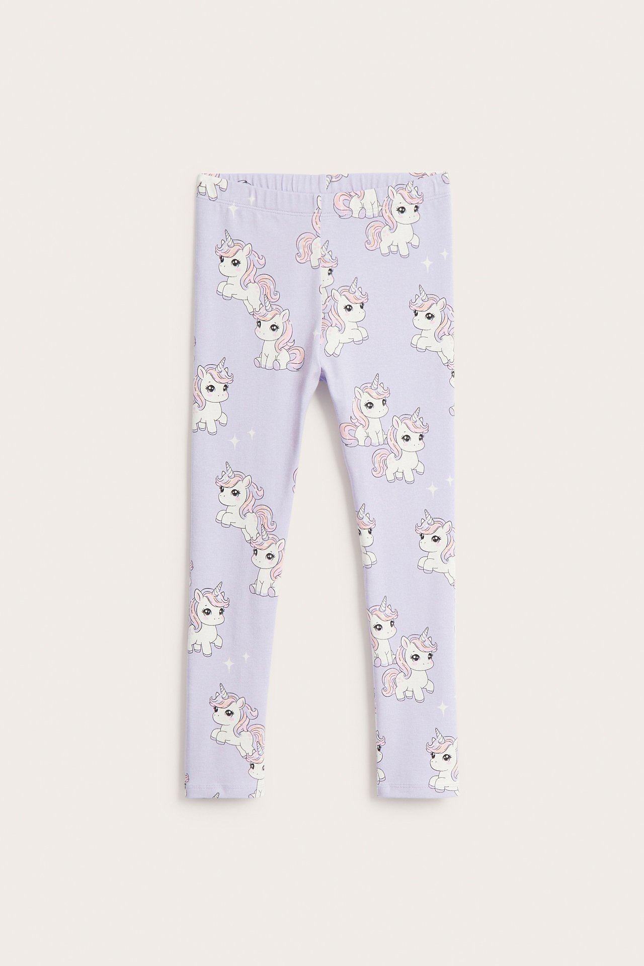 Edestä näkymä vaaleanliloista lasten trikooleggingseistä, joissa on yksisarviskuvio ja joustava vyötärö.