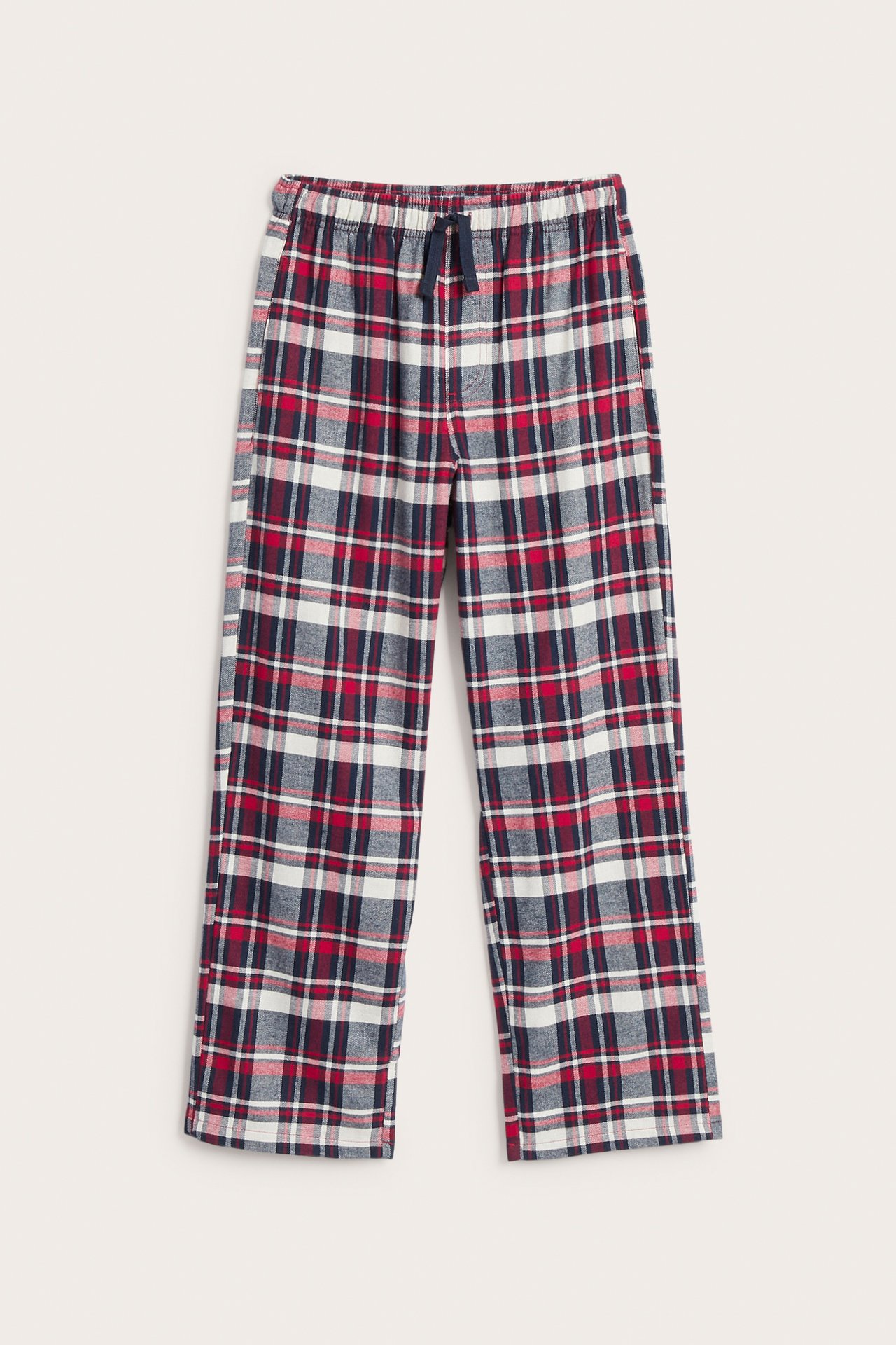 Framifrån, rutiga pyjamasbyxor i rött, vitt och marinblått med resårlinning och dragsko.