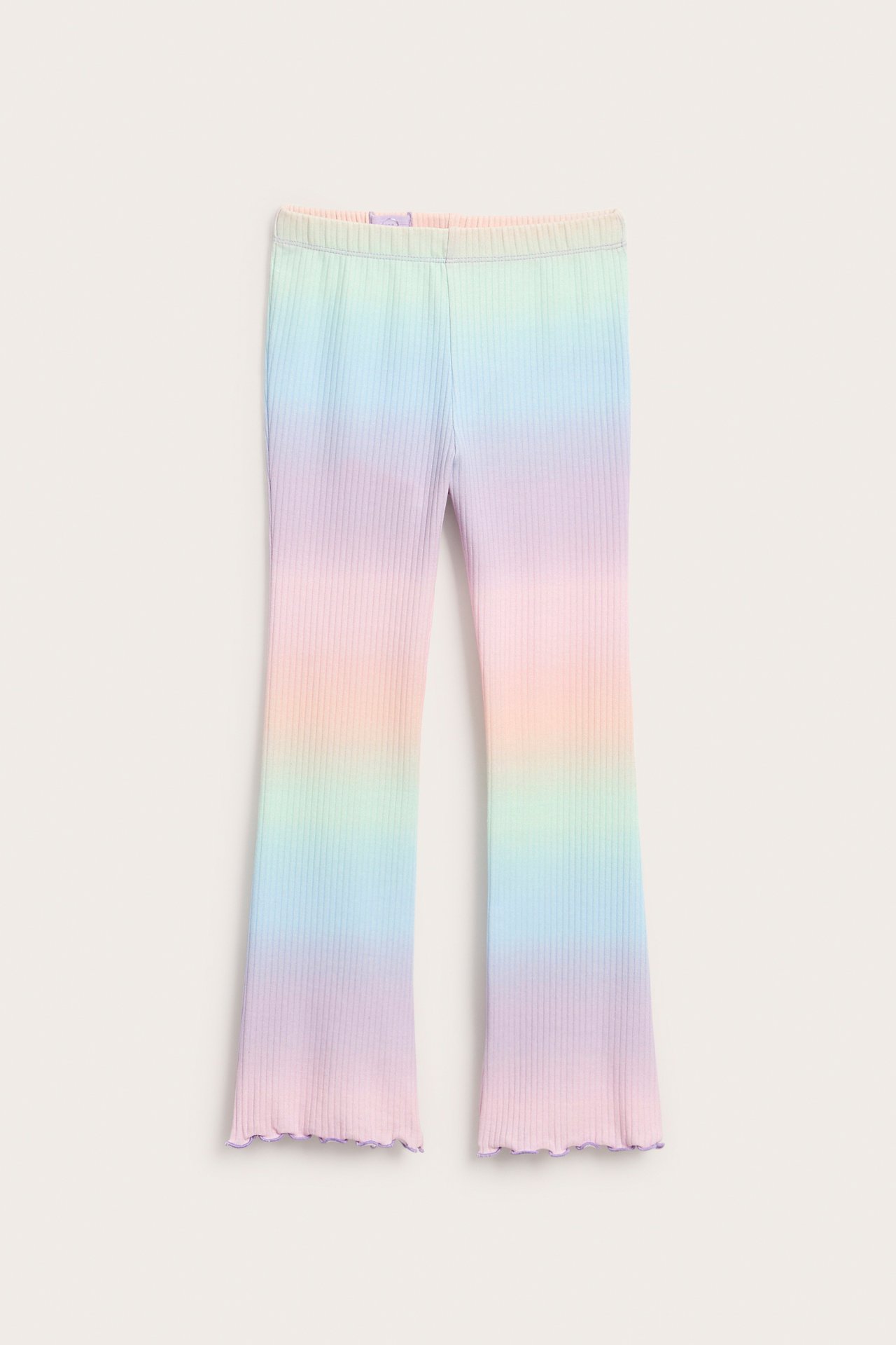 Edestäpäin katsottuna lasten pastellinvärinen sateenkaari-gradientti ribbineuleleggingsit resori vyötäröllä.