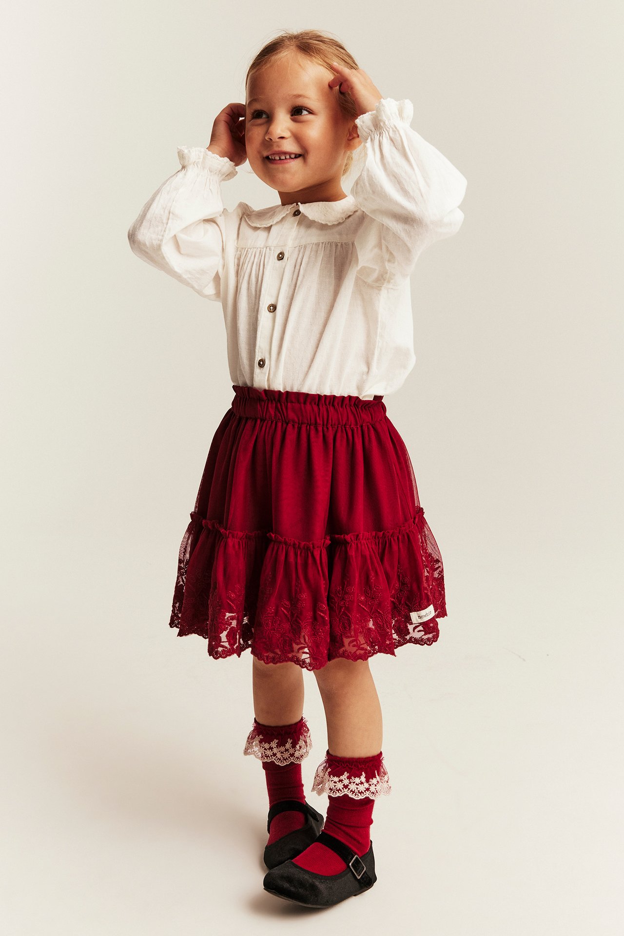 Vevd bluse med brodert krage