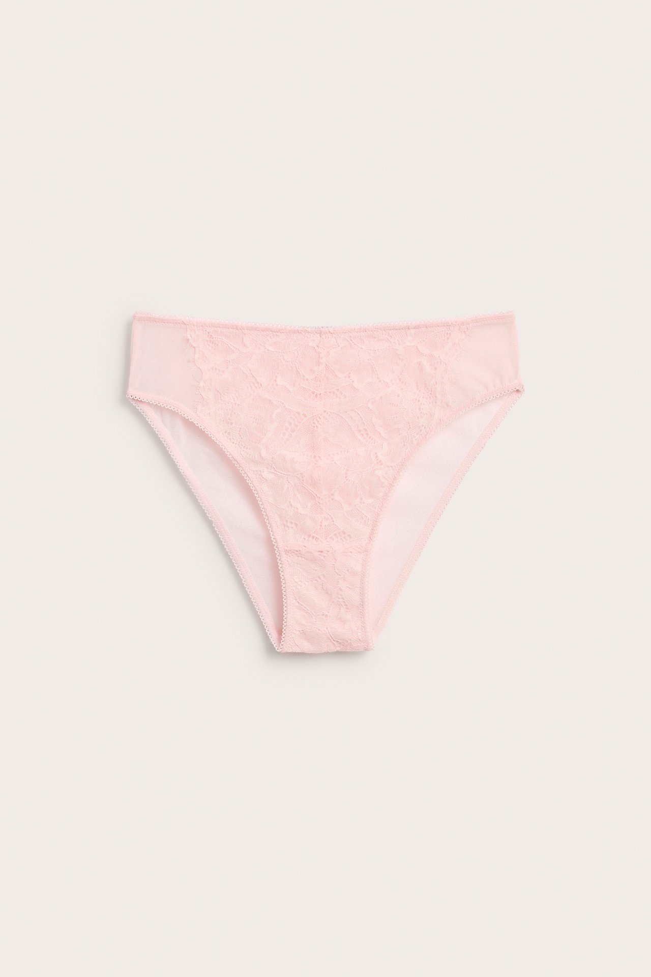 Front view: rosa Brazilian-trosa i mjuk spets och mesh, medelhög midja, picotkant.