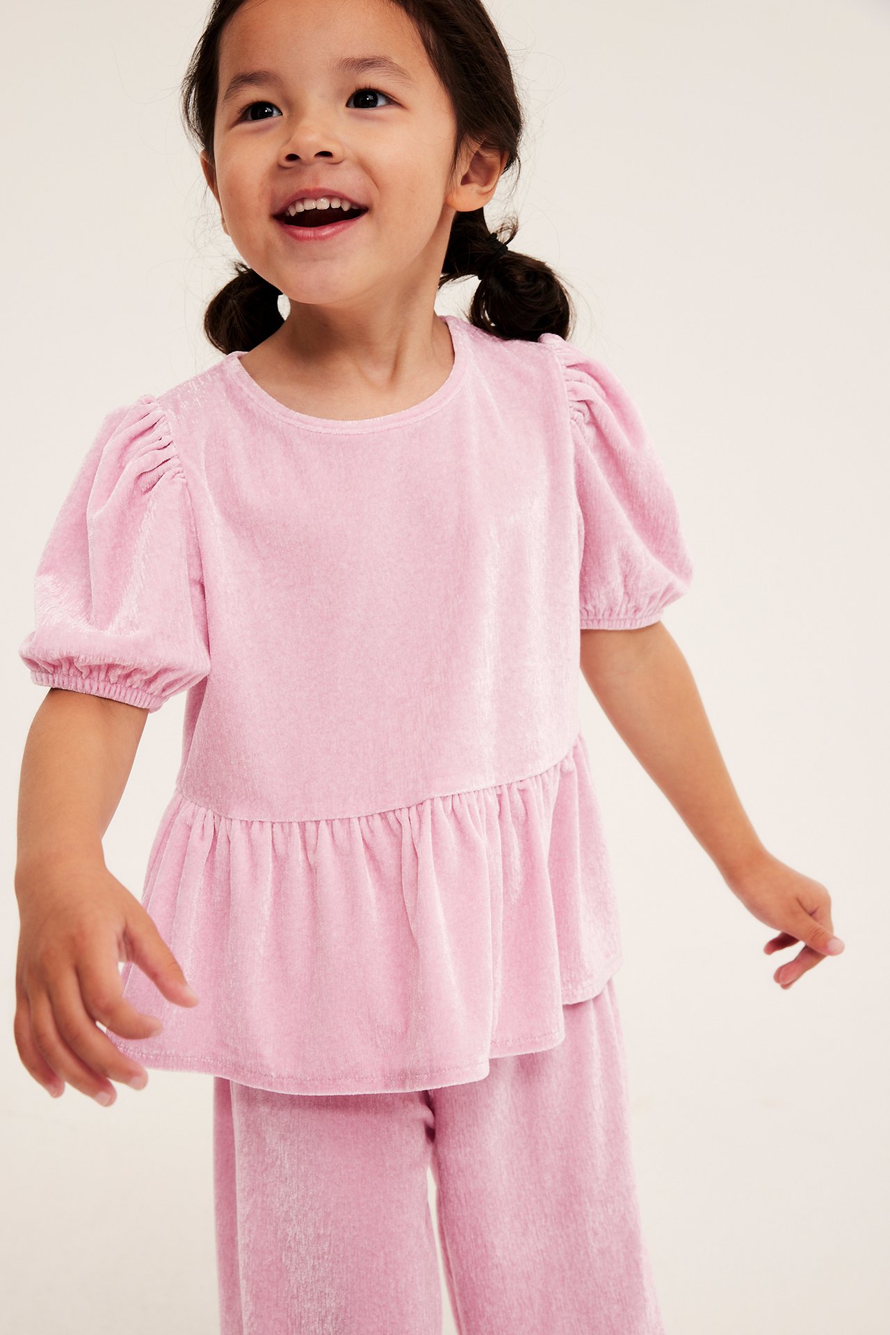 Topp i velour med peplum