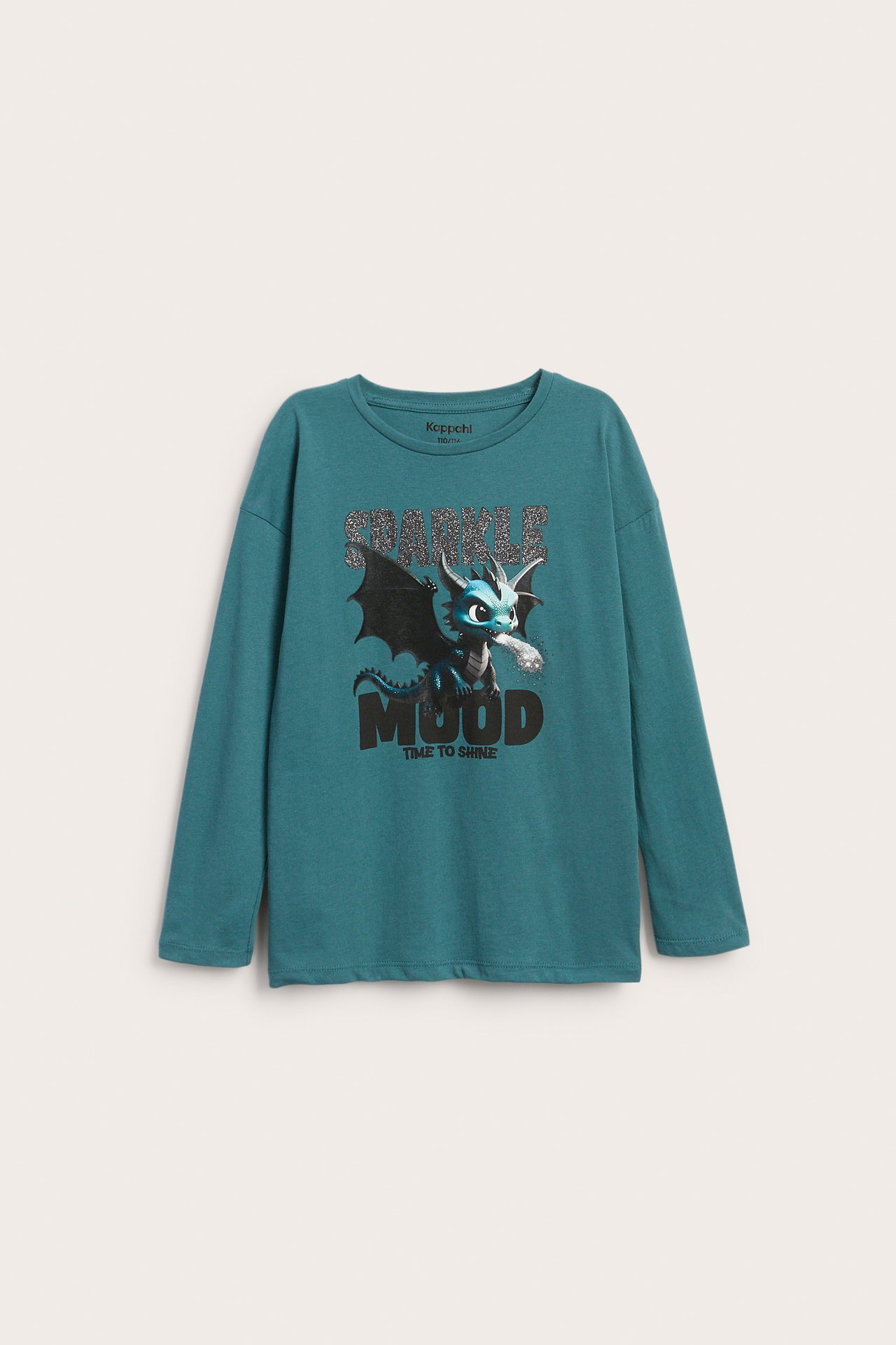 Framifrån, en långärmad t-shirt för barn i teal med blått drakmotiv och glittrig text 'SPARKLE'.