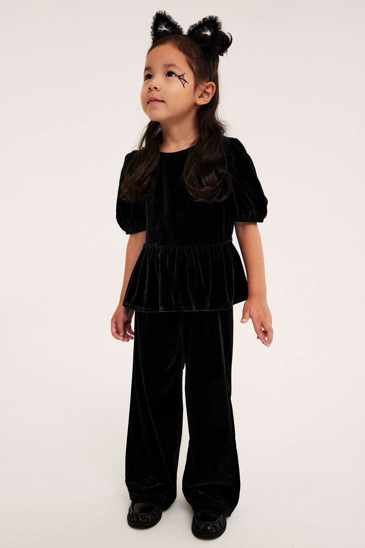 Topp i velour med peplum