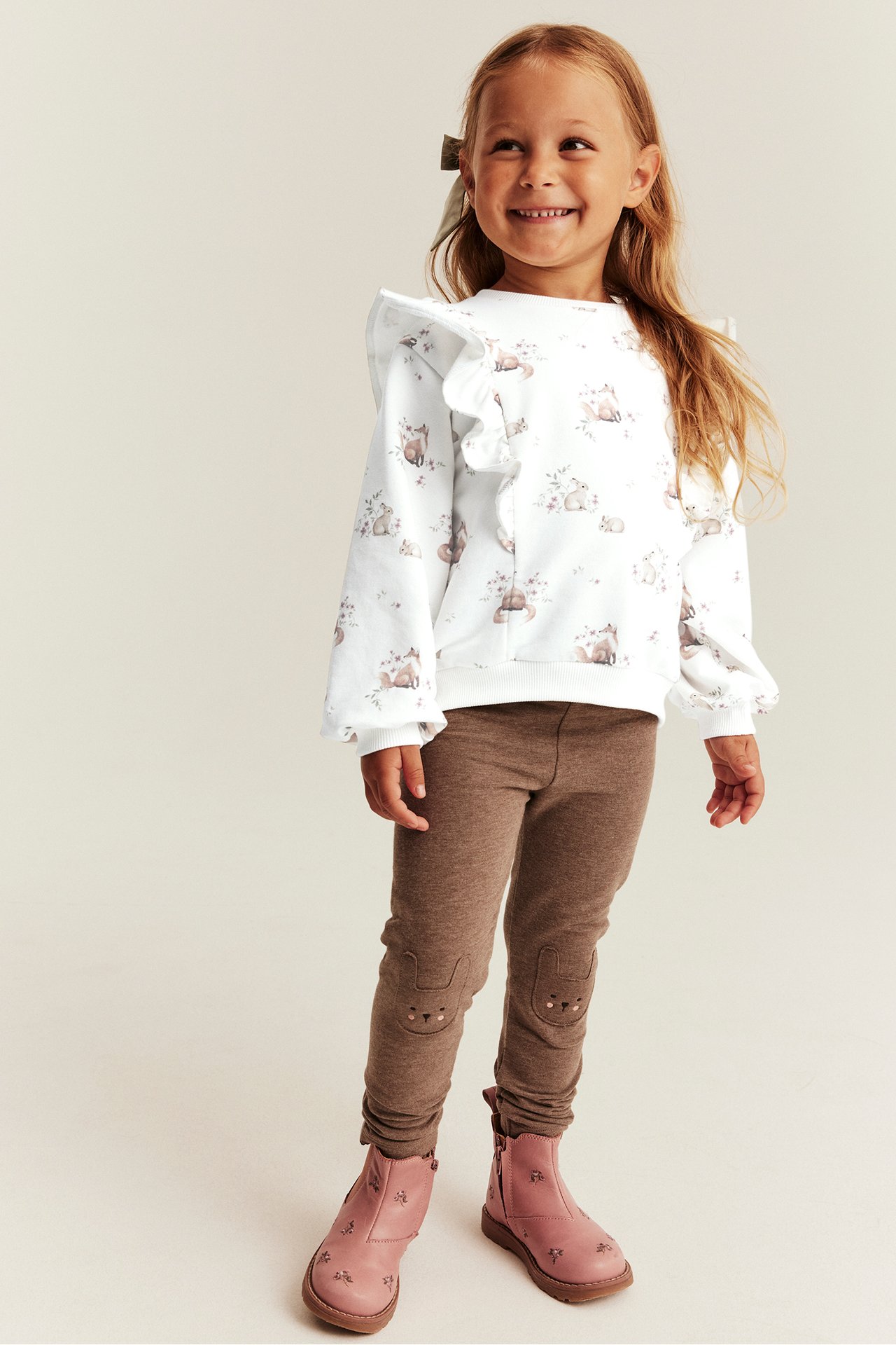 Mönstrad sweatshirt med volanger