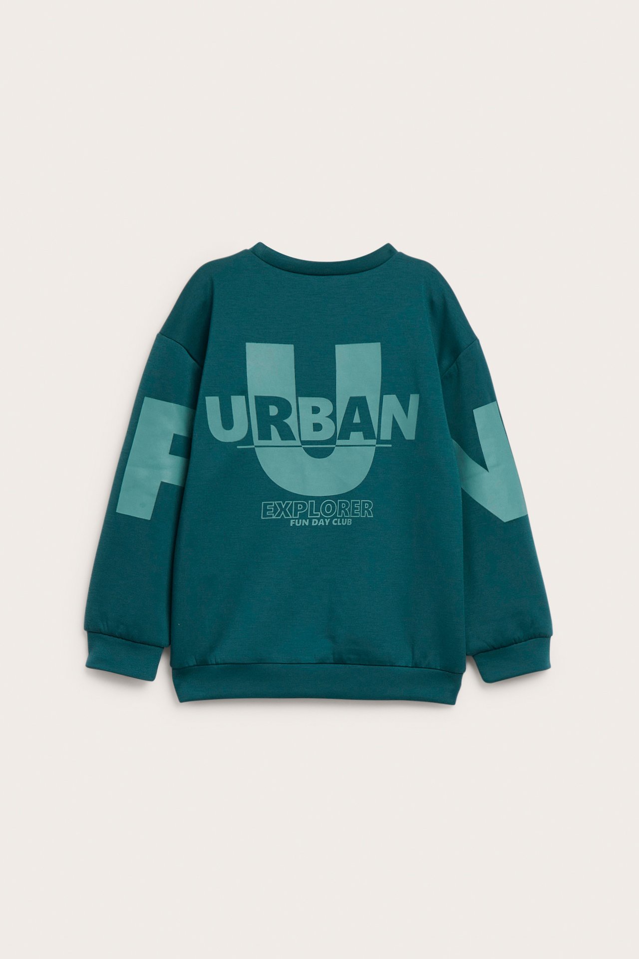 Barnsgenser i teal, bakfra, med 'URBAN' og 'EXPLORER' trykk.