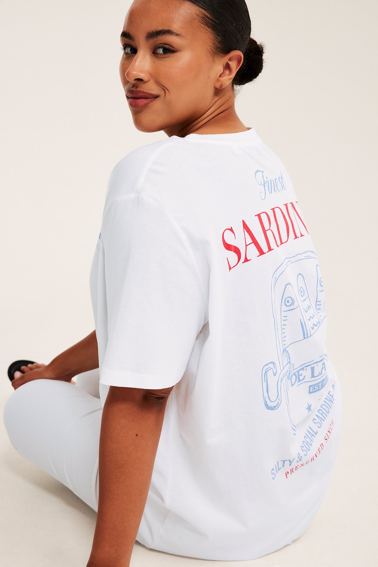 Lång t-shirt med tryckta motiv
