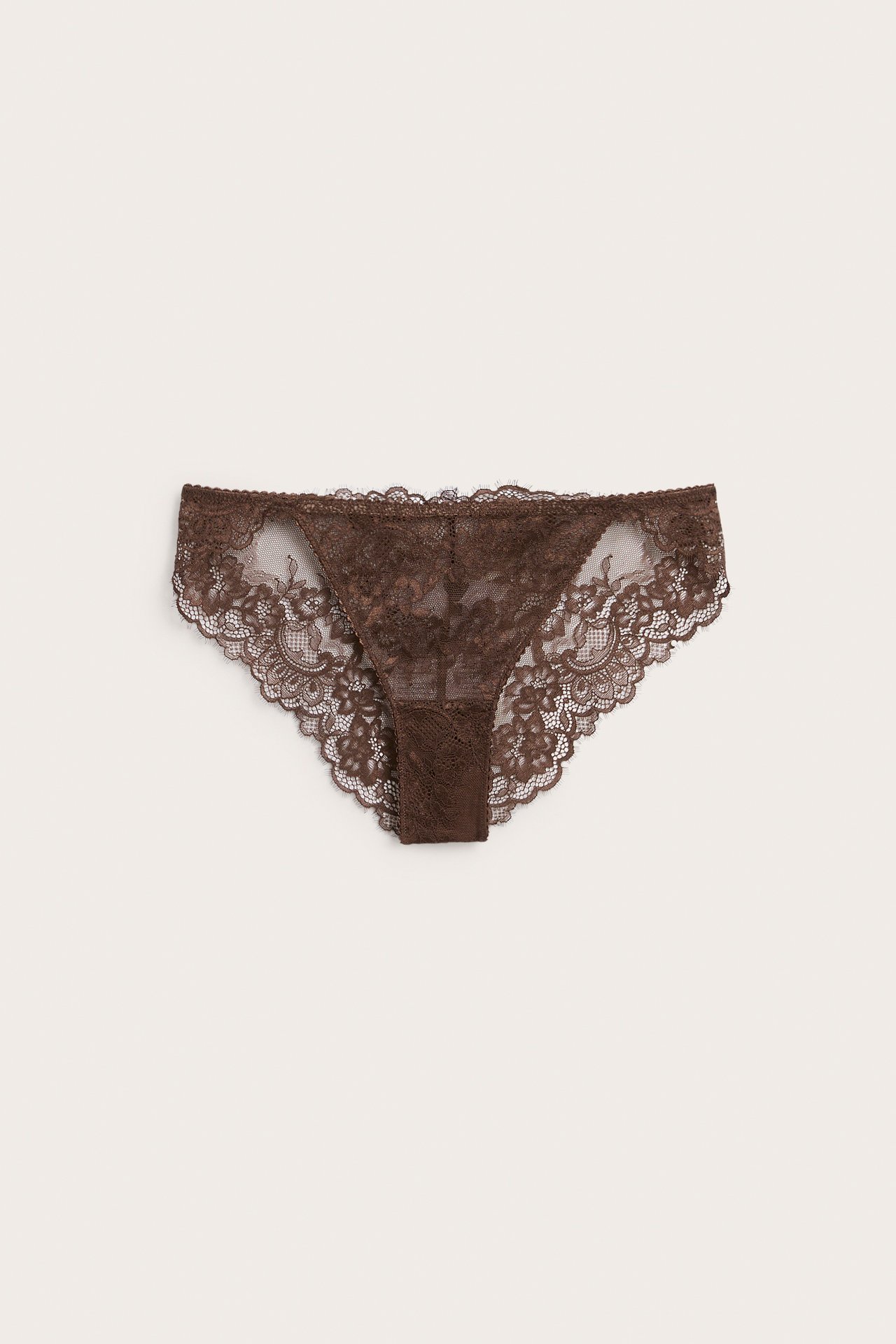 Widok z przodu brązowych, przezroczystych, koronkowych majtek bikini w kwiaty.