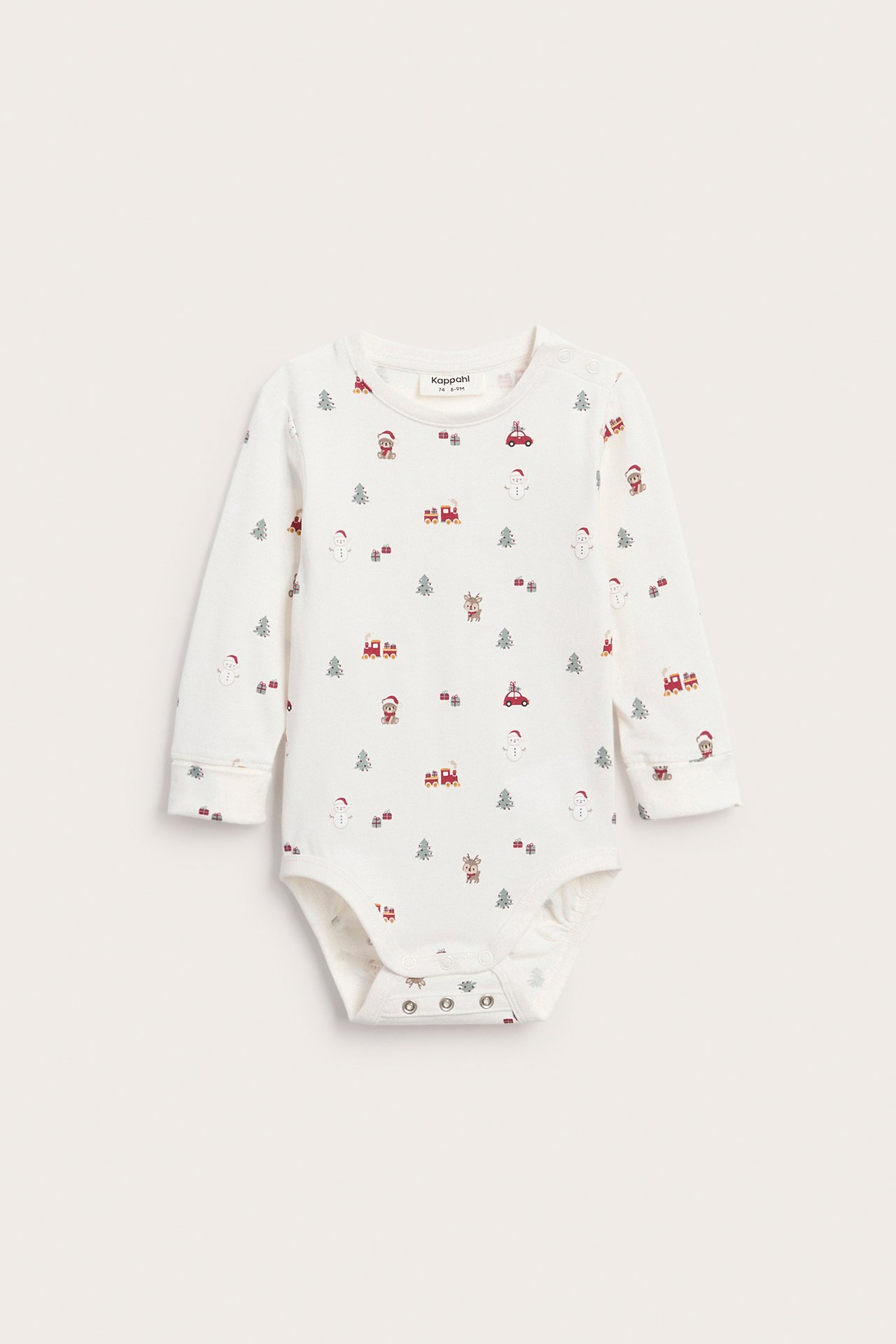 Framifrån, vit babybody med lång ärm, julmönster och tryckknappar.